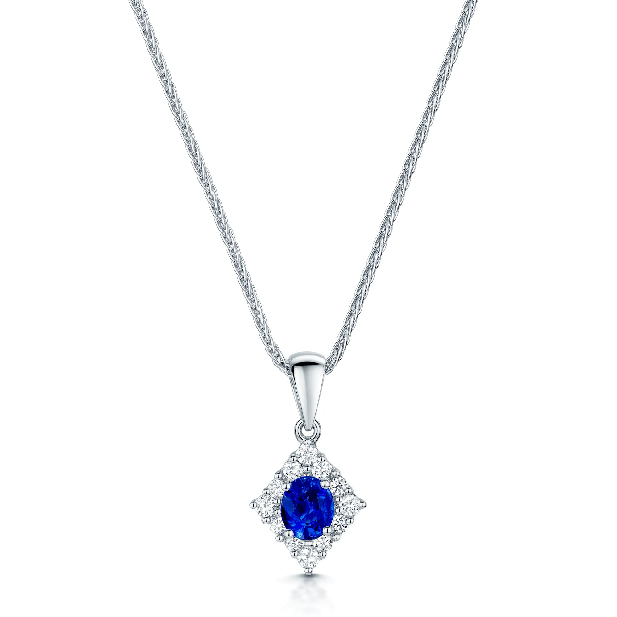 18ct White Gold Oval Cut Sapphire And Diamond Halo Pendant