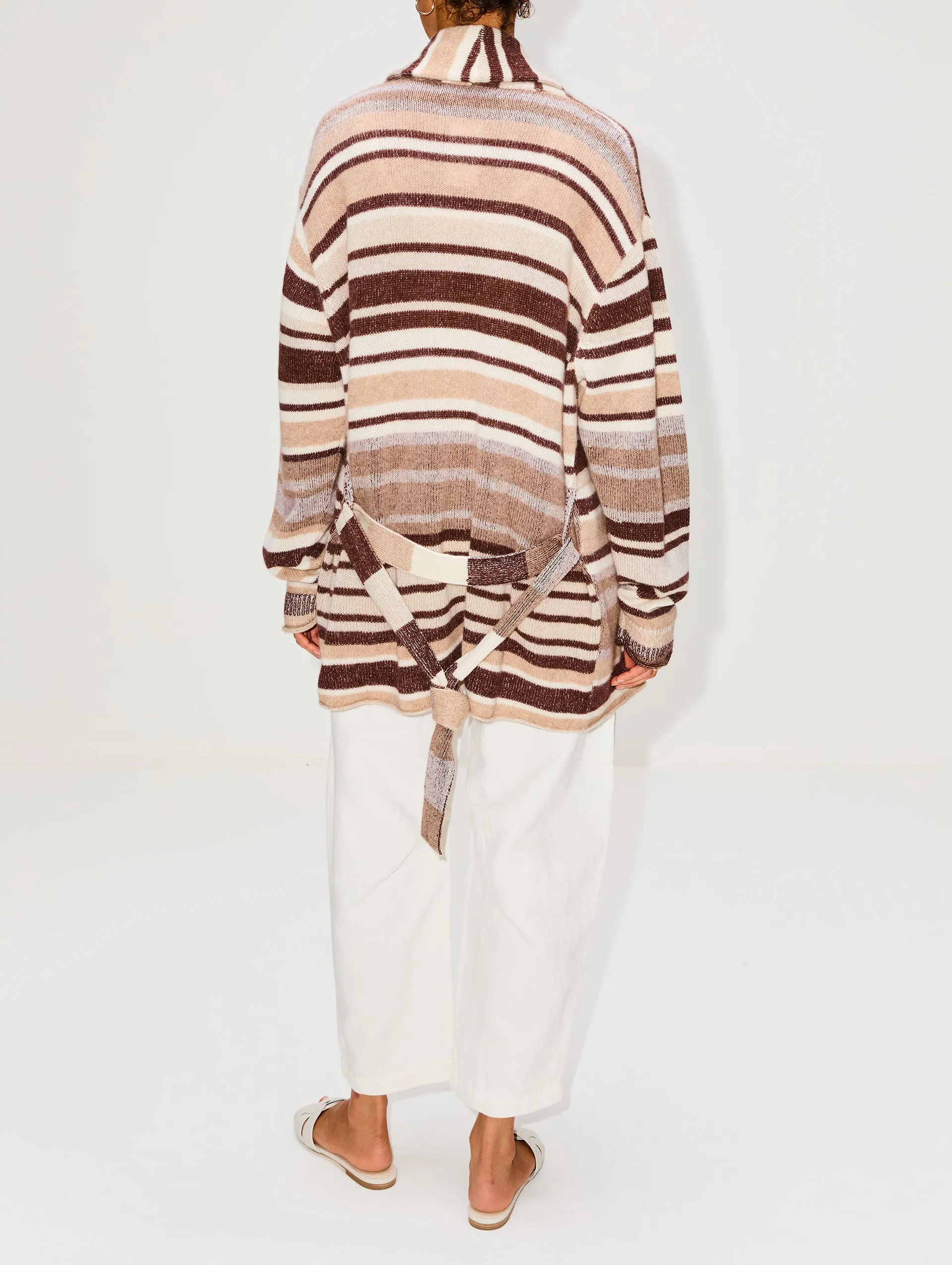 Sure! Here’s an optimized title for the product Belted Cardigan with added modifiers to enhance its appeal:

Cozy Belted Knit Cardigan for Women - Stylish Long Sleeve Fall Sweater Outerwear

Feel free to adjust any part of this to better fit your brands voice or specific style!
