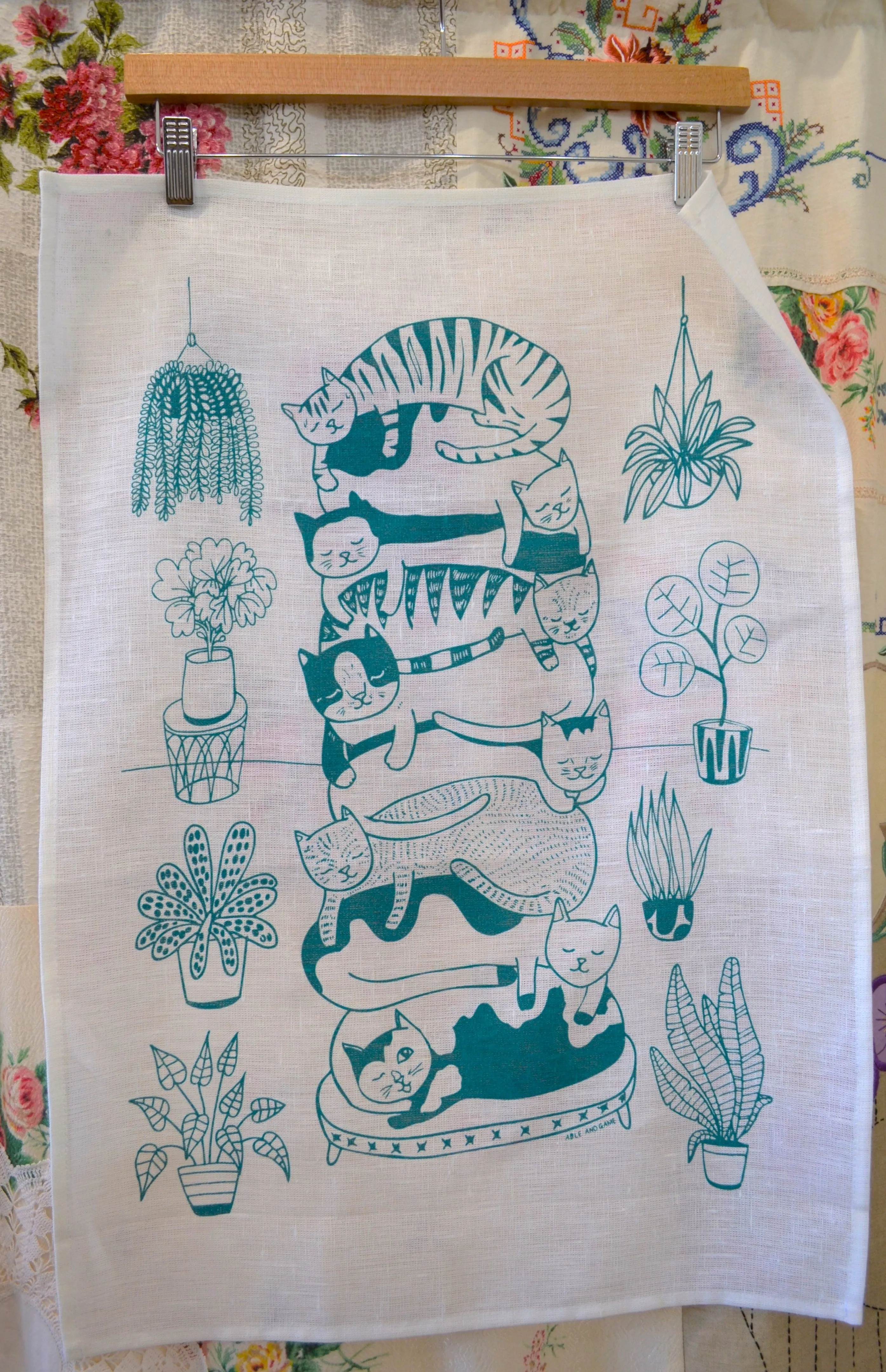 Stack of cats tea towel